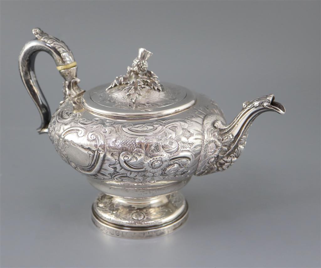 A George IV? silver pedestal teapot with thistle finial, marks rubbed,